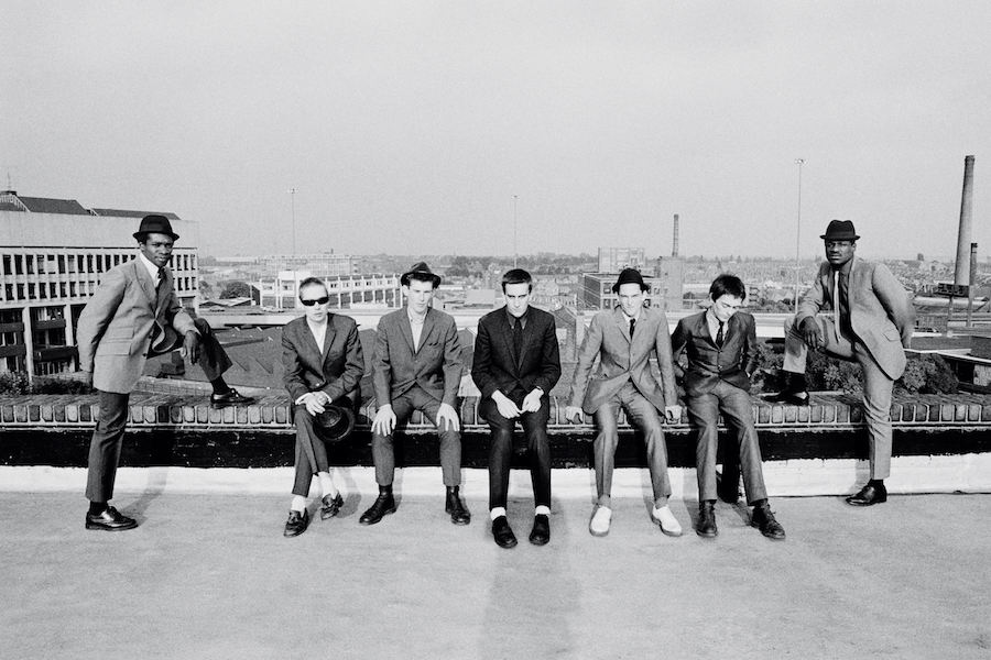 English ska revival band The Specials photographed on the roof of the Coventry Odeon during the shoot for their first LP, 1979. Left to right: Lynval Golding, Jerry Dammers, Roddy Radiation, Terry Hall, Horace Panter, John Bradbury and Neville Staple. Photo by Chalkie Davies/Getty Images.