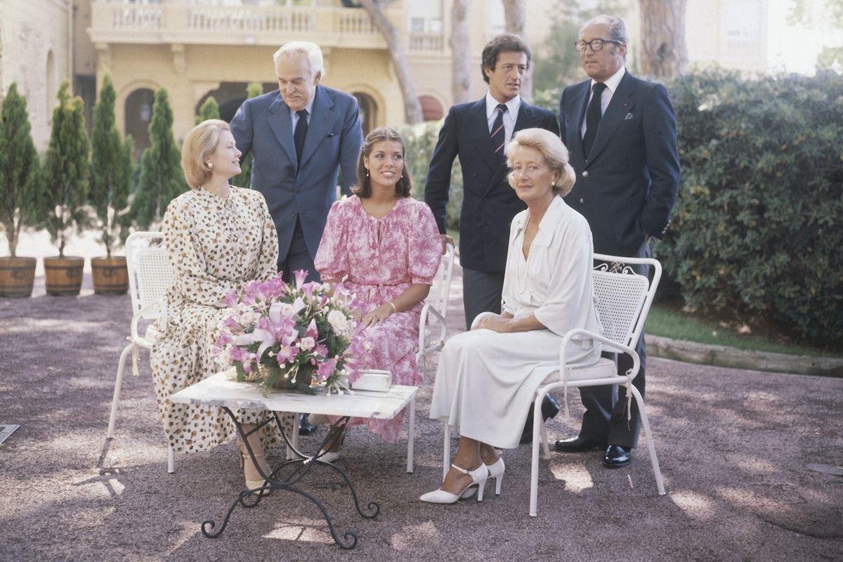 Princess Grace of Monaco, Prince Rainier, Princess Caroline, Philippe Junot, and his parents, Lydia and Michel, at the Royal Palace in Monte Carlo in August 1977 (Photo by Keystone/Hulton Archive/Getty Images)