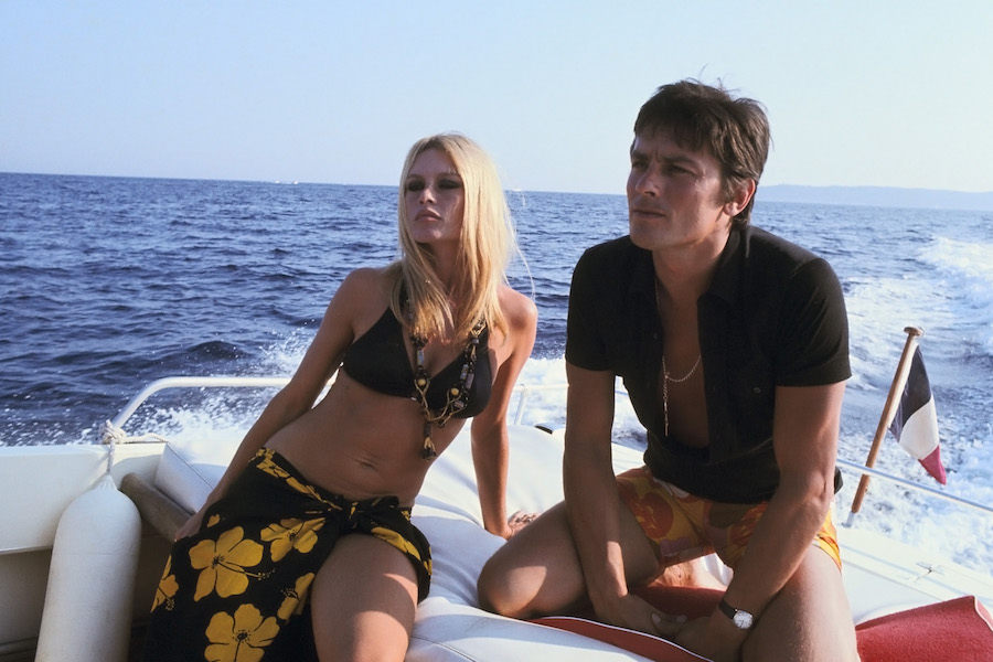 Brigitte Bardot and Alain Delon cruise around St. Tropez aboard a speedboat in 1968.