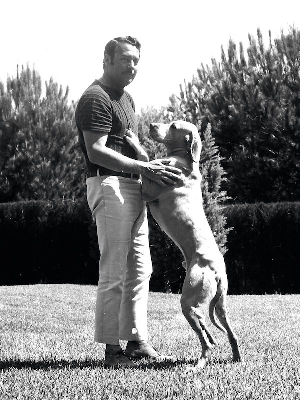 At the Marbella Club with his dog, 1967. Photo by Gianni Ferrari/Cover/Getty Images.