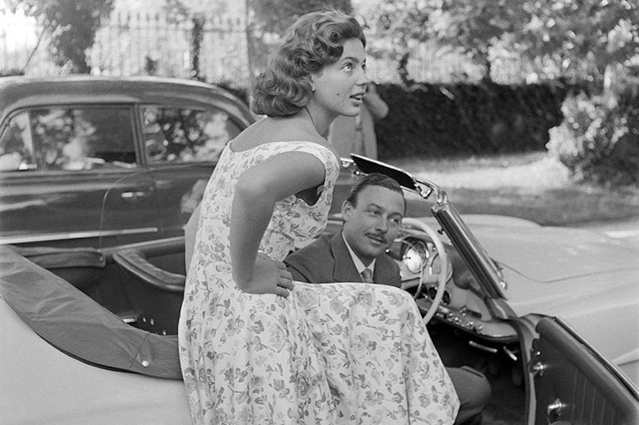 Prince Alfonoso and wife Ira perch in a convertible, circa 1950s.