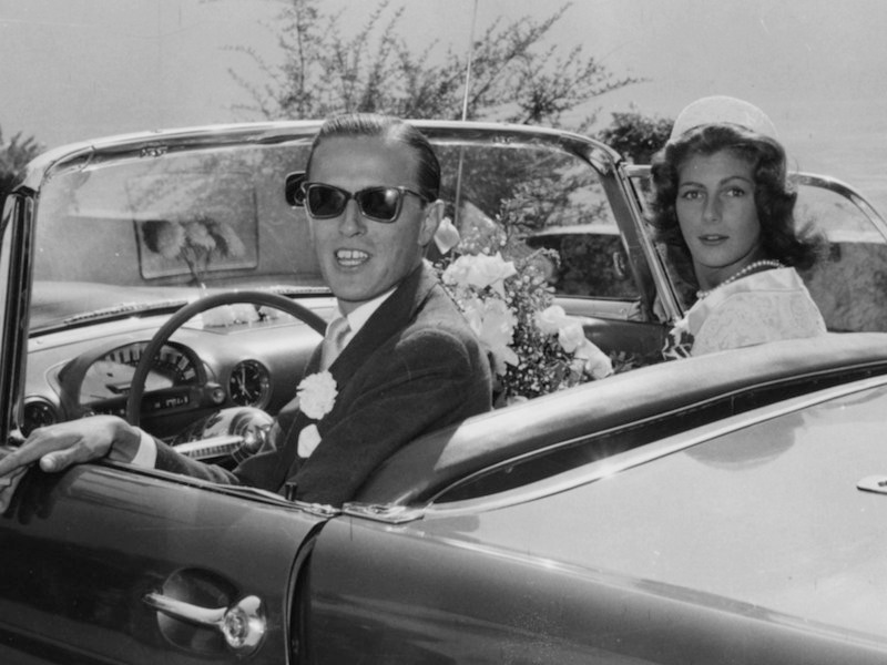 Baron Heinrich and Fiona begin their honeymoon in Lugano, 1956. Photo by Keystone/Hulton Archive/Getty Images.