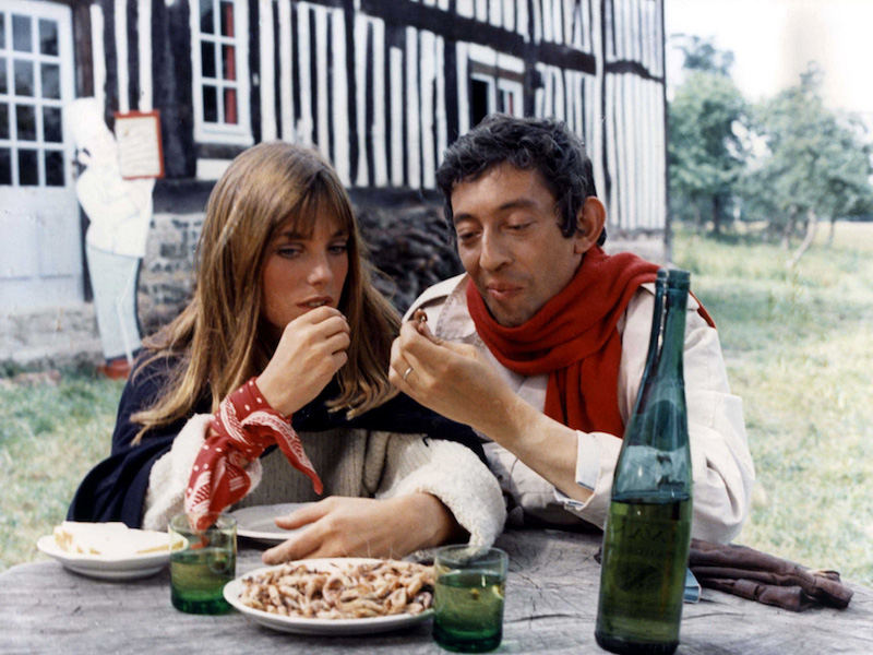 Serge takes a break from filming with his wife Jane Birkin on the set of Slogan, 1969.