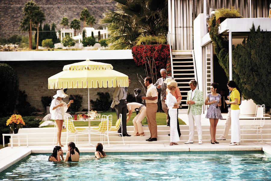 Guests by the pool at Nelda Linsk's desert house in Palm Springs, January 1970. The house was designed by Richard Neutra for Edgar J. Kaufmann. Photo by Slim Aarons/Hulton Archive/Getty Images.