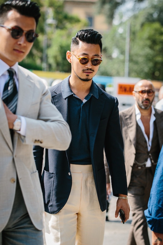 The sartorial polo shirt once again, this time worn tone-on-tone with a three-roll-two navy blazer.