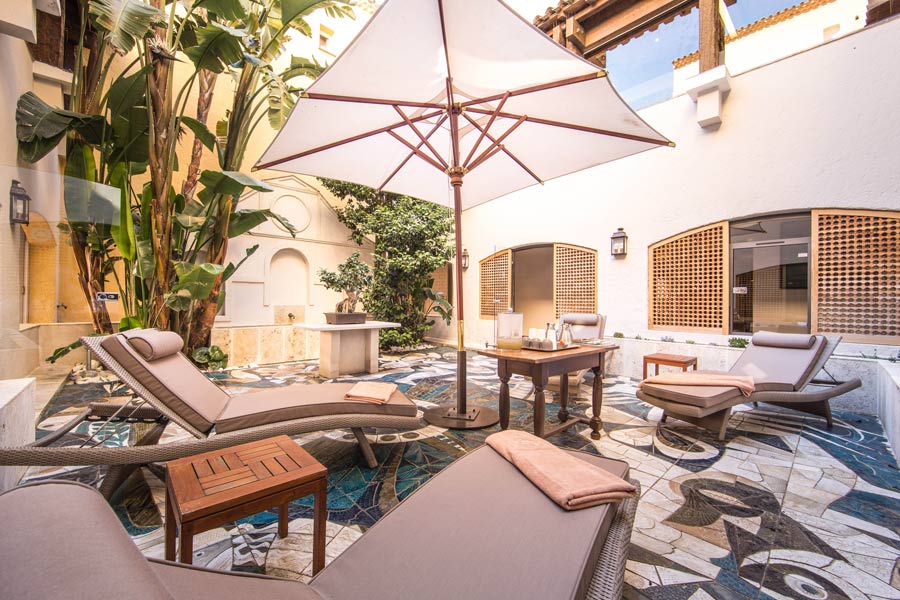 A tiled courtyard at Hotel Byblos.