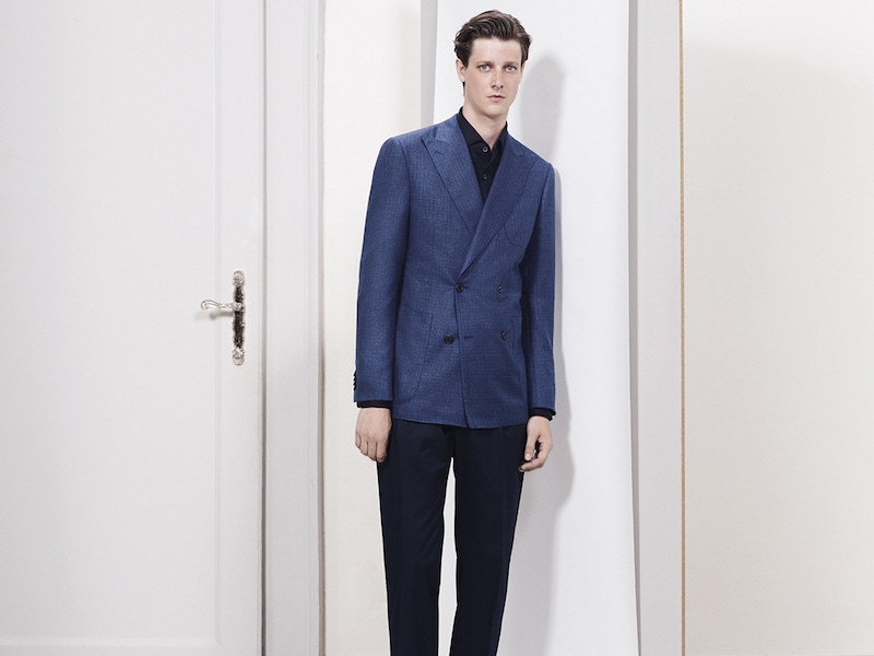 Corneliani: Tonal simplicity, featuring an unstructured double-breasted jacket over a navy shirt and trousers.