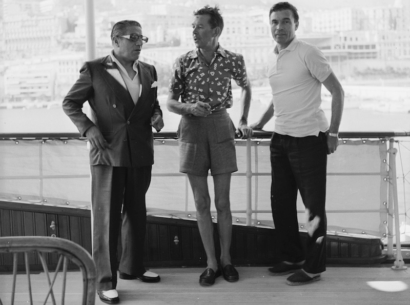 On board Aristotle Onassis’ yacht ‘Christina’ with Porfirio Rubirosa in Monte Carlo, 1958. Photo by Slim Aarons/HultonArchive/Getty Images.