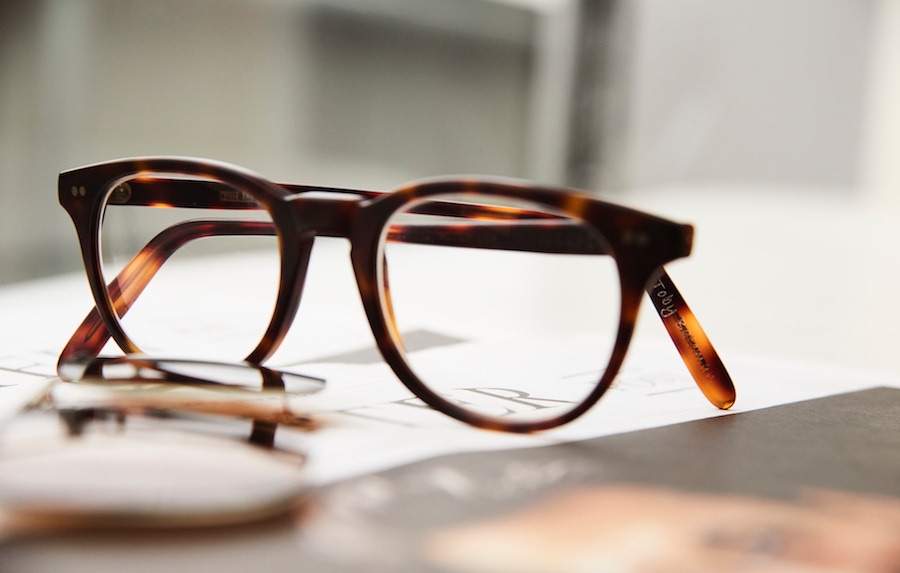 These gorgeous Cutler and Gross matte tortoiseshell bespoke frames with his name engraved in the inside of the right arm clearly gets some wear, as his surname has become somewhat faded over the years. They are matched with an Oliver Peoples x Kitsuné detachable clip-on polarised lens.