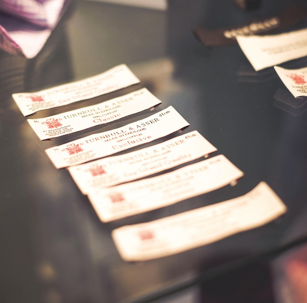 Examples of Turnbull & Asser's labelling, each one displaying their Royal Warrant. Photo by Justin Hast.