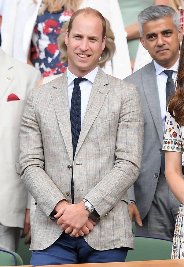 HRH Prince William attends the Men's Final of the Wimbledon Tennis Championships July 10, 2016 in a windowpane check blazer and knitted tie. Photo by Karwai Tang/WireImage.