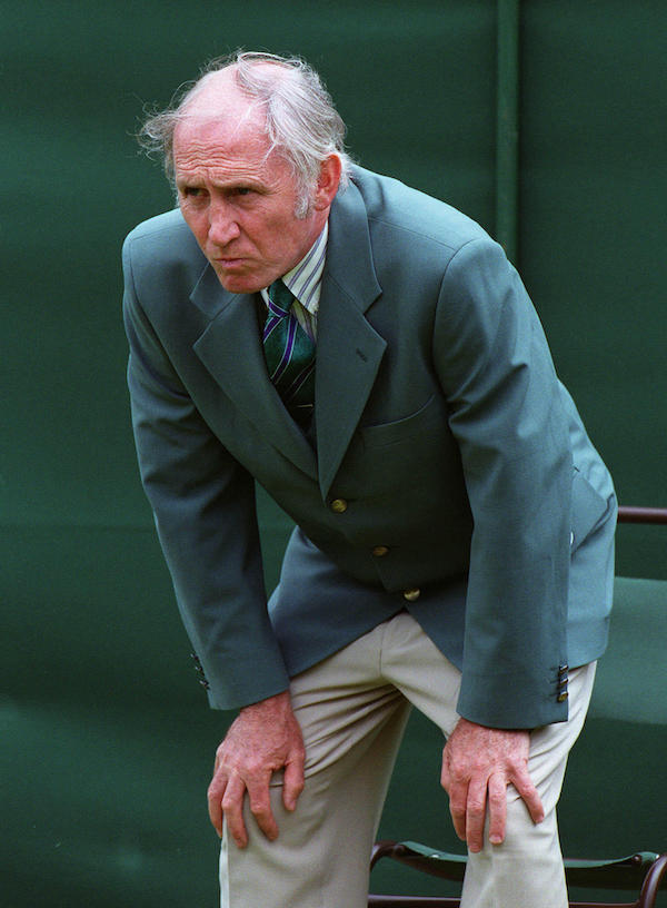 A line judge at Wimbledon in 1999 wearing the requisite green uniform, before Ralph Lauren began designing for the event.