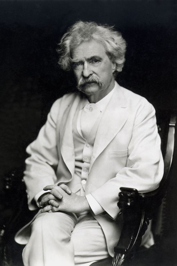 American Humorist and writer Mark Twain looks elegant and sophisticated in a white three piece, circa 1880. Photo by Granger/REX/Shutterstock.