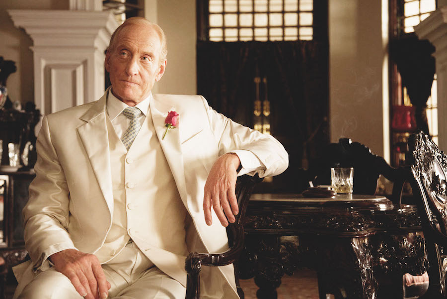 Charles Dance wears a tailored three piece white suit in a scene from Midnight’s Children, 2012. Photo by Moviestore/REX_Shutterstock.