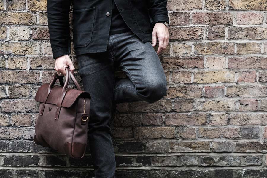 The chocolate brown Bennett Winch Briefcase is made from 24oz canvas and vegetable-tanned leather.