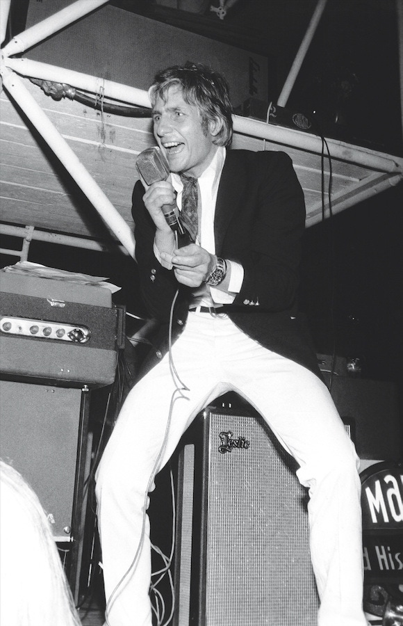 Singing on stage, circa 1960s.