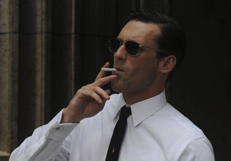 Don Draper’s wire-framed sunglasses and narrow tie have an undeniably retro feel, paired with French cuffs on a crisp white shirt and an ever-present cigarette.