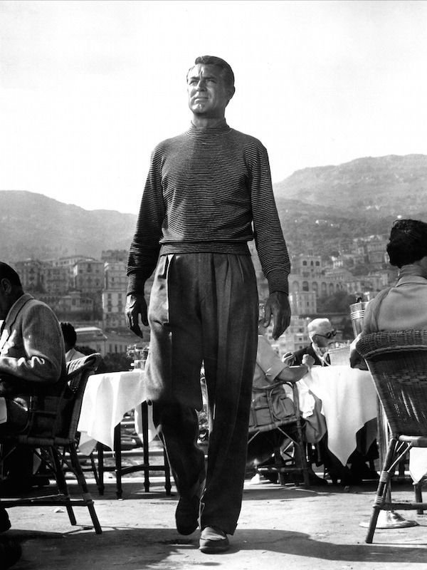 Cary Grant’s famous look in To Catch a Thief, 1955. His voluminous, high-waisted trousers are a particular highlight.