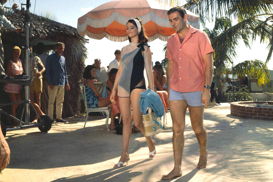 Sean Connery pictured and Claudine Auger on the set of 'Thunderball' at a beach resort in the Bahamas, 1965. Photo by Rolls Press/Popperfoto/Getty Images.