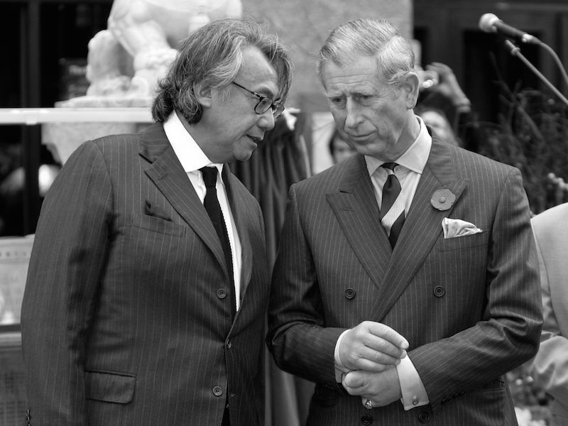 Sir David Tang speaks to Prince Charles during a royal visit to Chinatown in London, 2007. Photo by REX/Shutterstock.