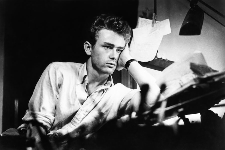 Wearing an Oxford shirt with the sleeves rolled up, circa 1955. Photo by INTERFOTO/Alamy.