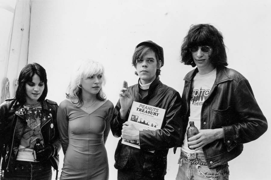 Joan Jett, Debbie Harry, David Johansen and Joey Ramone pose at a punk wedding, 1970. Photo by Roberta Bayley/Redferns/Getty Images.