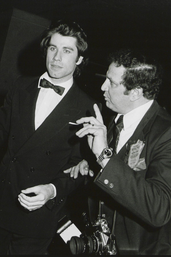 John Travlota and Ron Galella in 1990. Photo by The LIFE Picture Collection/Getty Images.