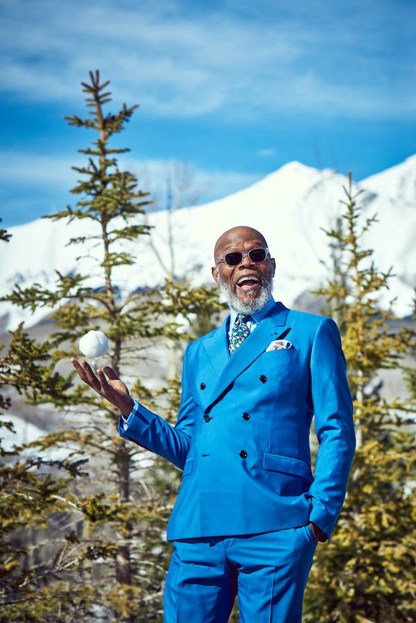 Blue wool silk double-breasted suit, Dolce & Gabbana; sky blue and white check cotton shirt and silk pocket-handkerchief, both Budd Shirtmakers; blue and yellow floral silk print tie, Polo Ralph Lauren and vintage mother of pearl boutonnière, both property of The Rake; eyeframes, Barton Perreira, property of Samuel L. Jackson.