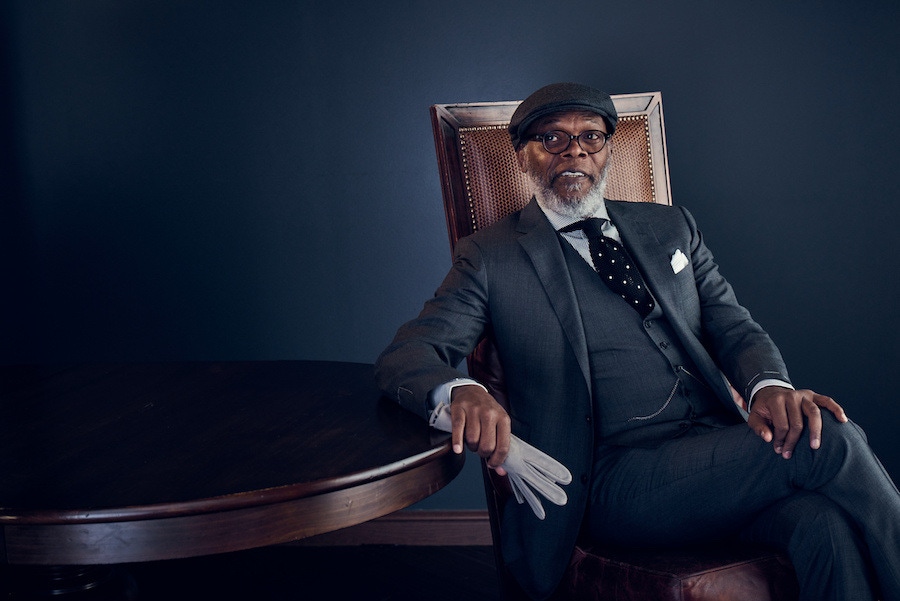 Charcoal-grey three-piece suit, black and white cotton striped shirt, black and white spotted silk-knit tie, white cotton pocket-handkerchief, all Ralph Lauren Purple Label; charcoal-grey wool Oslo cap, Lock & Co.; eyeframes, Barton Perreira, property of Samuel L. Jackson.