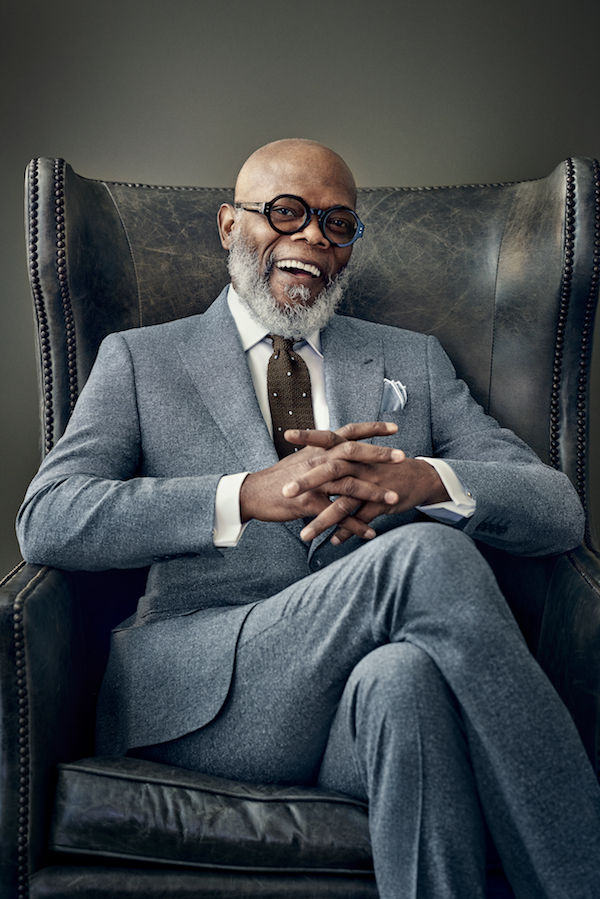 Grey wool and silk pinhead single-breasted suit, Gieves & Hawkes; white cotton shirt with French cuffs and brown and pale blue spotted silk-knit tie, both Emma Willis; grey and white silk linen pocket-handkerchief, Budd Shirtmakers. Gold vintage cufflinks, property of The Rake; eyeframes, Marc Jacobs, property of Samuel L. Jackson.