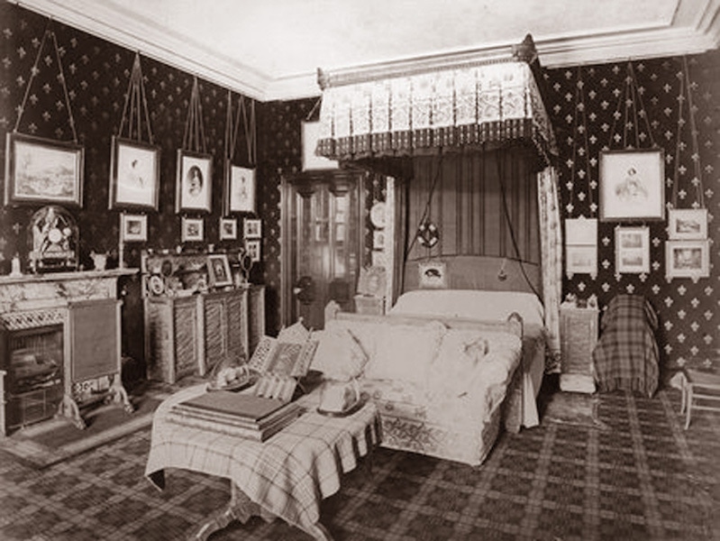 Queen Victoria's tartan-heavy bedroom in Balmoral, circa 1880. Rooms in the royal residence featured tartan wallpaper, curtains, carpets and upholstery.