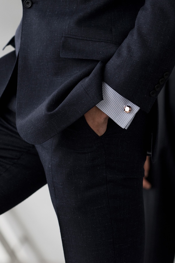 The Oliver cufflinks by Alice Made This have a diamond-pattern knurling around the edge.