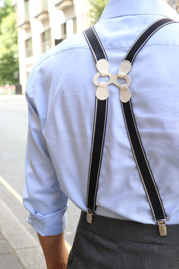 Ambrosi's grey single-pleated trousers with Albert Thurston's navy and cream clip-on braces.