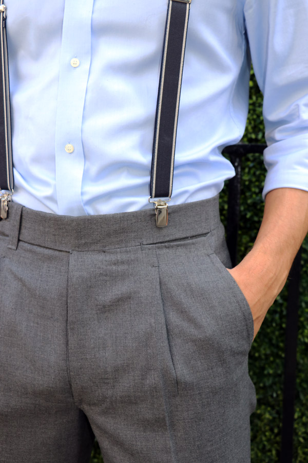 Ambrosi's grey single-pleated trousers with Albert Thurston's navy and cream clip-on braces.