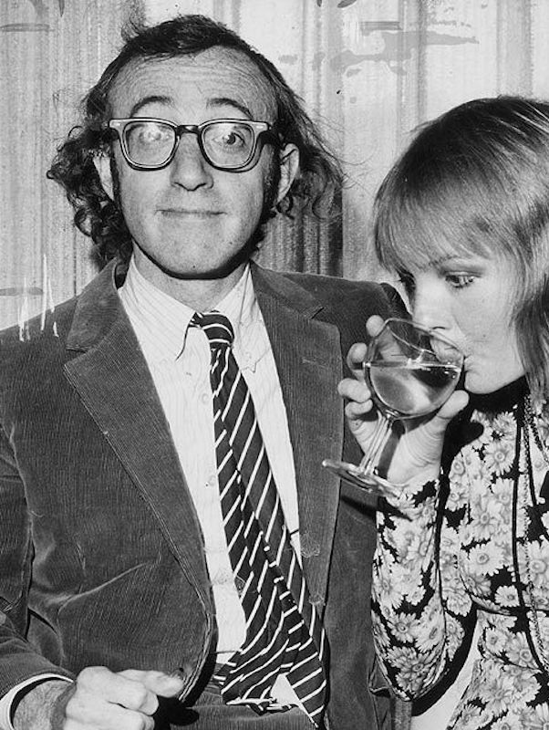 Director Woody Allen channels geek chic in a corduroy suit and thick-framed glasses, circa 1970.