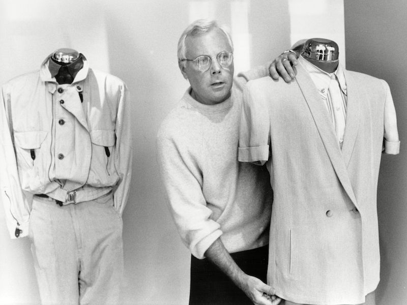 Giorgio stands between two of his designs in his studio in New York, 1989. Photo by John Minihan/ANL/REX/Shutterstock.