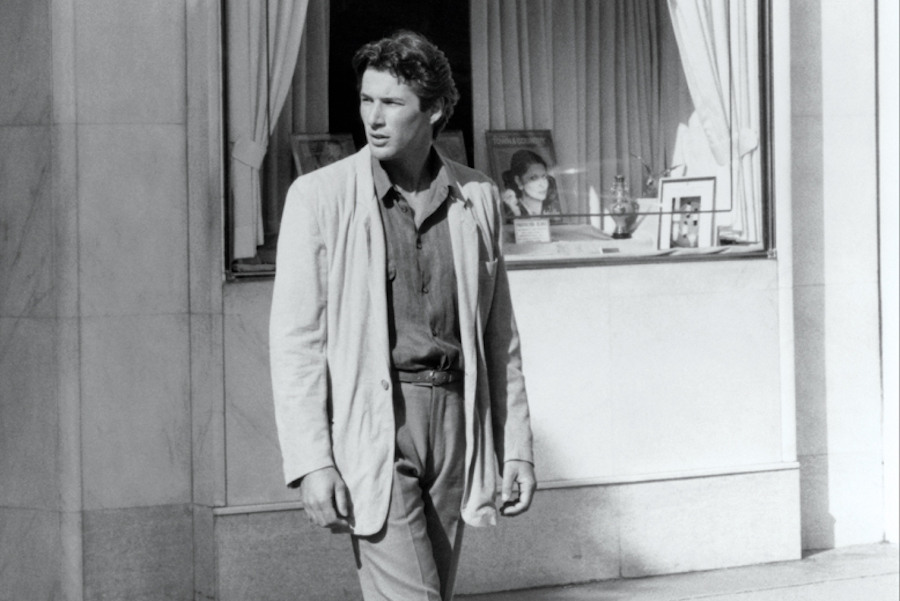 Armani dressed Gere in an unstructured, half-lined and longer-than-typical ventless linen jacket with a grey shirt and pleated grey trousers to create a sultry and casual appearance, 1980.