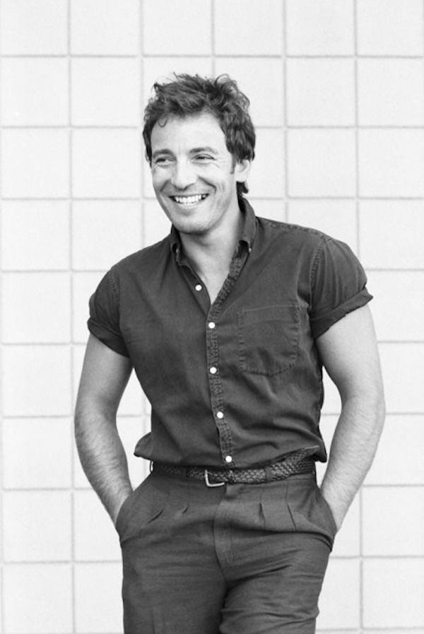 Springsteen's style was simple and relaxed as seen here wearing pleated trousers and a short sleeve shirt.