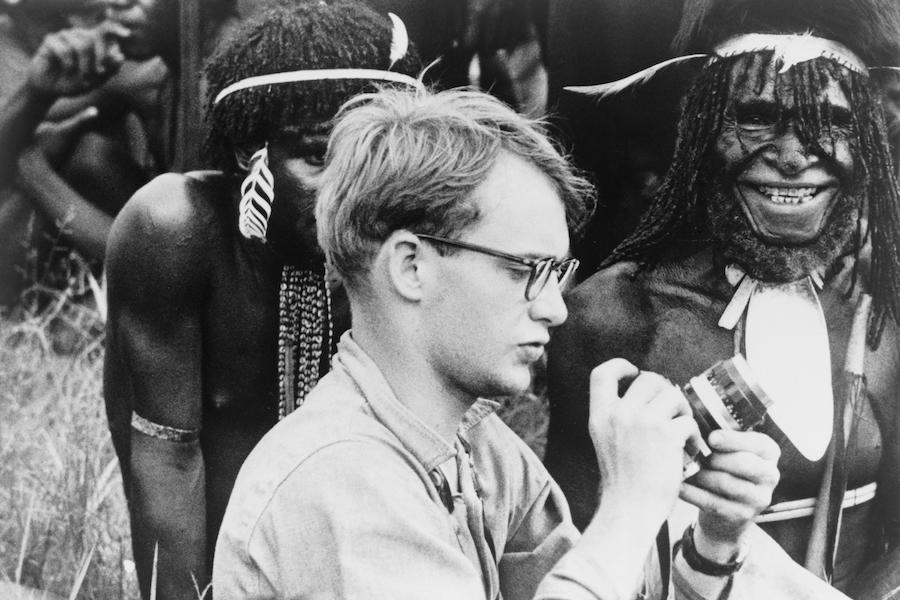 Michael C. Rockefeller photographing the Dani, a neolithic tribe, while on an expedition in New Guinea, 1961.