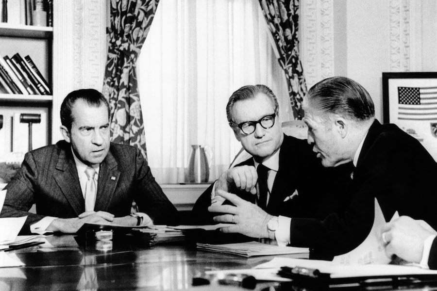 Governor Nelson Rockefeller meets with President Richard Nixon and Secretary of Housing and Development George Romney at the White House, circa 1971. Photograph by Everett Collection Historical/Alamy Stock Photo.