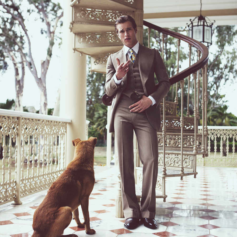 Jules Raynal wears chocolate brown leather Oxford shoes by Crockett & Jones beneath a vintage three-piece suit by Chittleborough & Morgan. The trousers feature a generous turn up and demonstrate an elegant ‘break’ over the shoes.