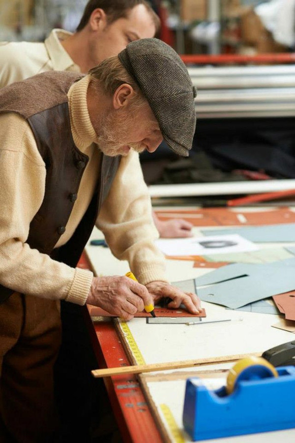 Aero Leather Founder Ken Calder in the brand's workshop.