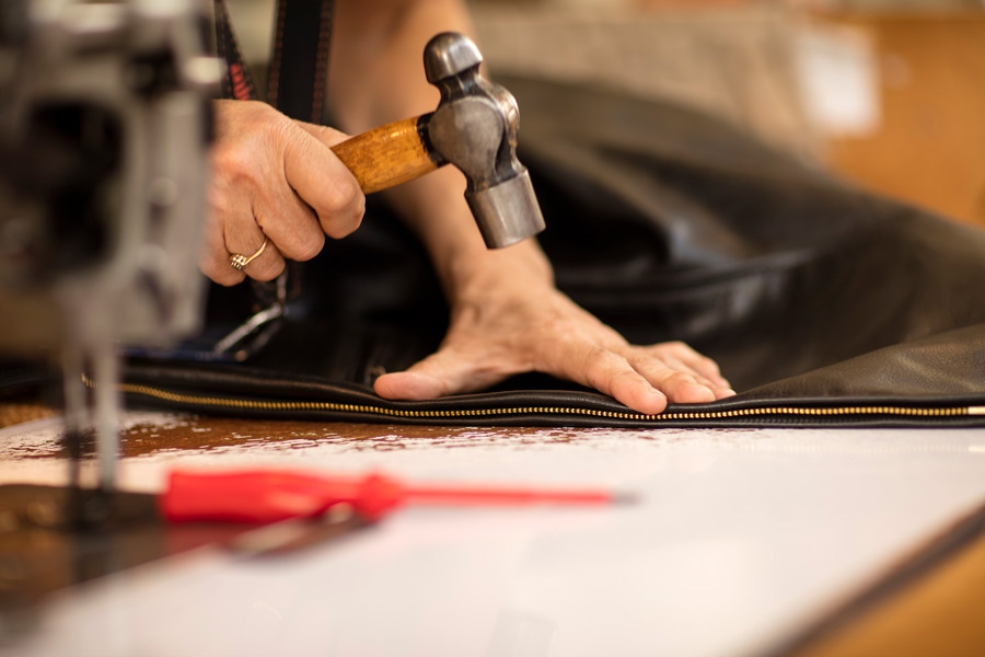 Adding the central zip to an Aero Leather jacket.