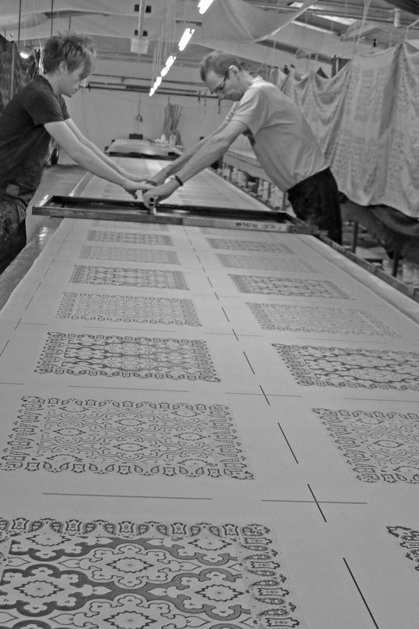 Hand screen printing Augustus Hare's ties.