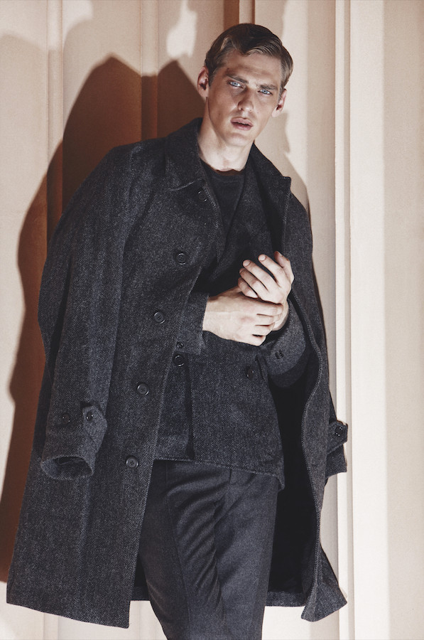 A charcoal grey wool two-piece with matching coat by Polo Ralph Lauren, worn over a knitted jumper.