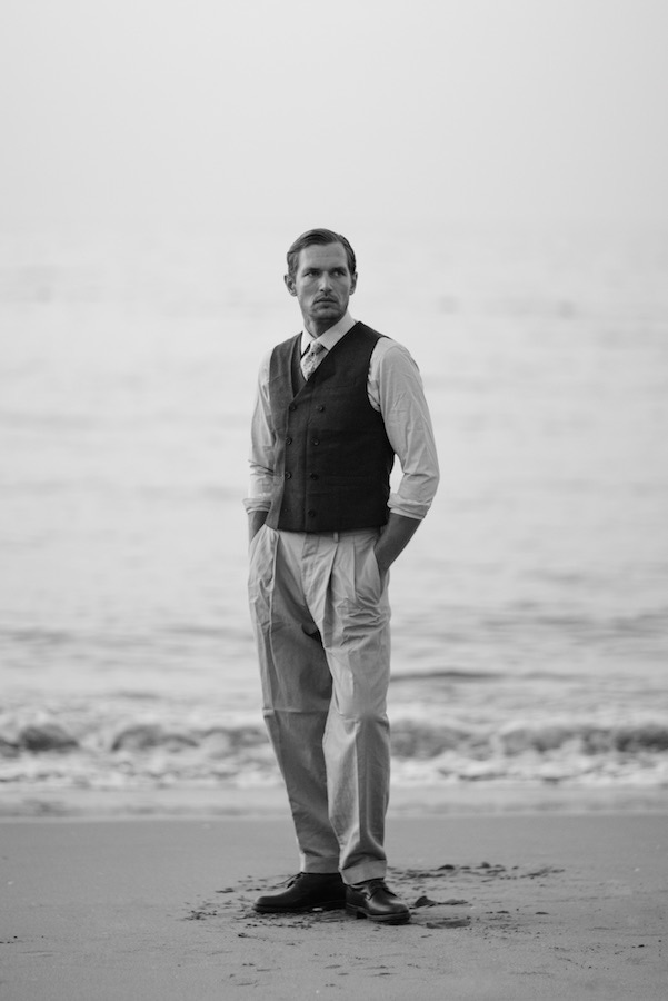 Robertas wears a Brunello Cucinelli double-breasted cotton-jersey waistcoat, also known as a vest, with wide-legged trousers by Caruso and a white shirt by Gieves & Hawkes.