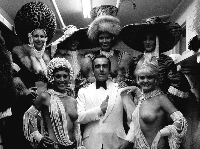 Sean Connery among Las Vegas showgirls on the set of Diamonds Are Forever, 1968. Photo by Terry O'Neill.