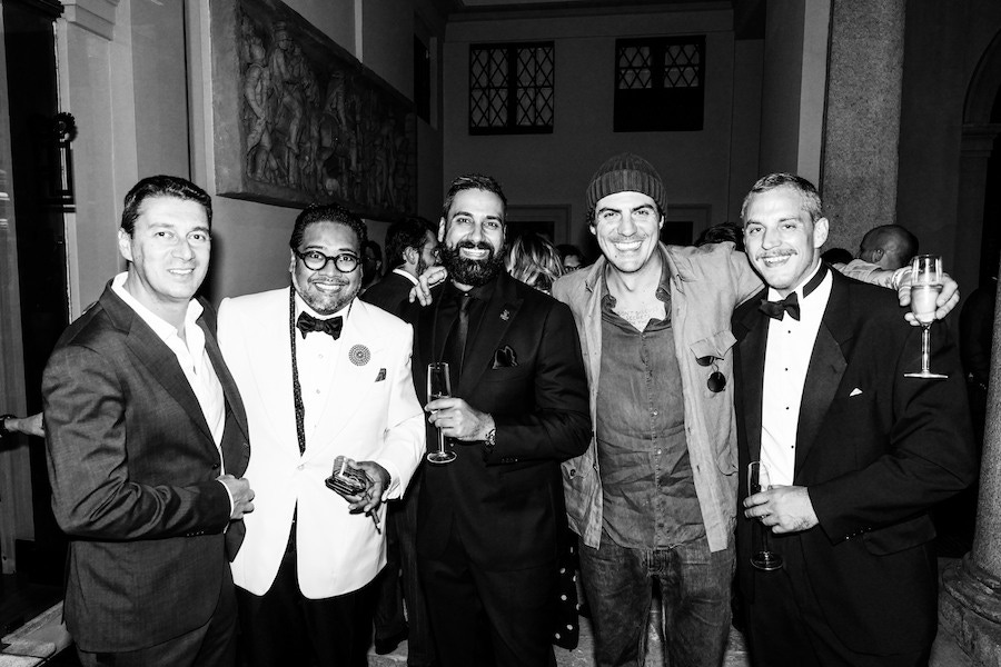 Mark Hawwa with guests at the Rubinacci store in Milan. Photograph by Pietro Baroni.