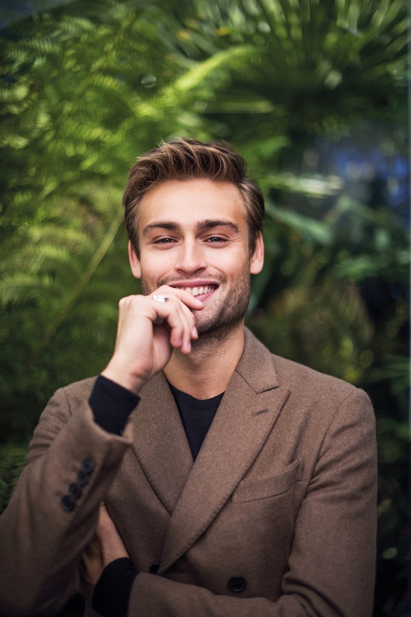 Brown sugar cashmere, double-breasted jacket, Berluti; black Merino wool jumper, John Smedley.