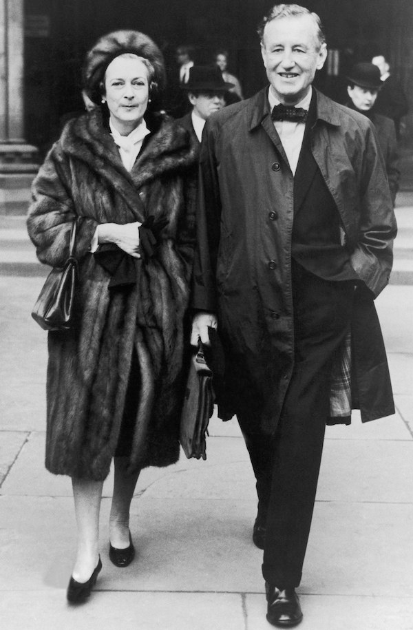 Photographed here with his wife Ann Charteris, a countess who he married after their well publicised affair. This photograph was taken in November 1963, the year before his death.